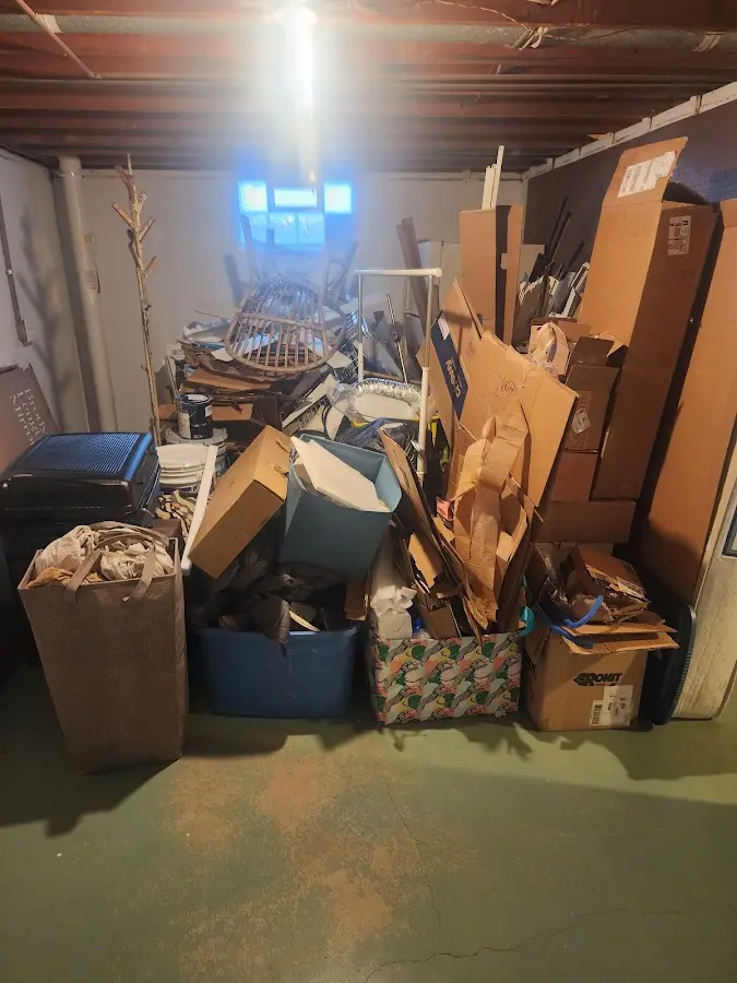 Roll-off dumpster container at job site for Yard Waste Dumpster Rental in Goshen